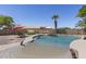 Beautiful backyard pool with water feature, desert landscaping and ample room for fun in the sun at 1518 E 12Th St, Casa Grande, AZ 85122