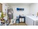 Functional laundry room with washer, dryer, and storage solutions for efficient organization at 1546 W Pierce St, Phoenix, AZ 85007