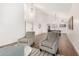 Bright and airy living room featuring hardwood floors, vaulted ceiling, and stylish decor at 1591 S Sycamore Pl, Chandler, AZ 85286