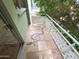 A unique balcony featuring a decorative tile snake and charming white metal railings at 1702 W Tuckey Ln # 209, Phoenix, AZ 85015