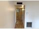 Hallway with hardwood flooring leading to bedrooms at 1702 W Tuckey Ln # 209, Phoenix, AZ 85015