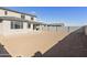 Large backyard with potential for landscaping, offering space for outdoor activities and creating a private retreat at 19033 W Rose Ln, Waddell, AZ 85355
