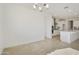Open dining area with contemporary lighting and kitchen view; great for entertaining friends and Gathering at 19033 W Rose Ln, Waddell, AZ 85355