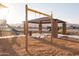 Community playground with covered picnic pavilion and swings near community walking paths at 19033 W Rose Ln, Waddell, AZ 85355