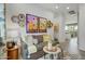 Comfortable living room with stylish wall art, floating shelves, and a cozy couch at 19420 W San Juan Ave, Litchfield Park, AZ 85340
