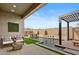 Stunning pool area with a pergola, elegant seating, and beautiful mountain views at 19420 W San Juan Ave, Litchfield Park, AZ 85340