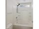 Bathroom featuring a shower, tub, and built in shelves at 19432 W Morning Glory Dr, Buckeye, AZ 85326