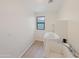Laundry room with sink, washer, and dryer at 19432 W Morning Glory Dr, Buckeye, AZ 85326