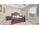 Bedroom with elegant dark wood furniture and abundant natural light at 1970 E Yellowstone Pl, Chandler, AZ 85249