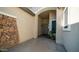 Inviting front porch featuring stone accents and covered entryway for a welcoming arrival at 1970 E Yellowstone Pl, Chandler, AZ 85249