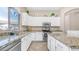Bright and airy kitchen with stainless steel appliances, granite countertops, and plenty of cabinet space at 1970 E Yellowstone Pl, Chandler, AZ 85249