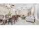 Spacious living and dining area featuring elegant furniture and tile flooring at 1970 E Yellowstone Pl, Chandler, AZ 85249