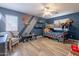 Bedroom featuring a bunk bed, a desk, and stylish decor for  at 21188 N Duncan Dr, Maricopa, AZ 85138