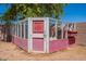 Well-maintained chicken coop in the backyard, perfect for poultry enthusiasts with secure, fenced enclosure at 21188 N Duncan Dr, Maricopa, AZ 85138