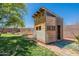 Fun playhouse with climbing structure in backyard, offering endless outdoor entertainment for  at 21188 N Duncan Dr, Maricopa, AZ 85138