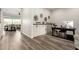 Home office featuring built-in storage cabinets and modern decor at 24035 N 171St Dr, Surprise, AZ 85387