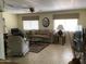 Bright and airy living room featuring tile flooring, comfortable seating, and natural light at 2405 N Eastwood Way, Mesa, AZ 85215