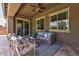 Inviting back patio with comfortable seating and shaded area, perfect for relaxing and enjoying the outdoors at 2604 W Balao Dr, Phoenix, AZ 85085