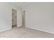 Empty bedroom with neutral walls and carpet at 2604 W Balao Dr, Phoenix, AZ 85085