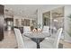 Cozy breakfast nook with a round table, seating for four, and natural light from the sliding glass door at 2604 W Balao Dr, Phoenix, AZ 85085