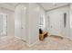 Inviting foyer with tiled floors and a bench seat at 2604 W Balao Dr, Phoenix, AZ 85085