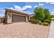 Charming home featuring a tile roof, manicured landscaping, and a spacious two-car garage at 2604 W Balao Dr, Phoenix, AZ 85085