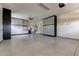 Spacious garage with epoxy flooring and ample storage cabinets at 2604 W Balao Dr, Phoenix, AZ 85085