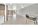 Inviting living room and dining area with modern ceiling fan and patio access at 27250 N 64Th St # 16, Scottsdale, AZ 85266