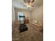 Bedroom including a ceiling fan, sofa, and treadmill at 2919 E Friess E Dr, Phoenix, AZ 85032