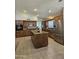 Bright and airy kitchen featuring updated appliances, a central island, and ample counter space at 2919 E Friess E Dr, Phoenix, AZ 85032