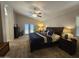 This bedroom has vaulted ceilings, a ceiling fan and access to a private balcony with lovely views at 2919 E Friess E Dr, Phoenix, AZ 85032