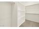 Walk-in closet with built-in shelving for optimal storage and organization at 4035 S 176Th Dr, Goodyear, AZ 85338