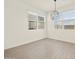 Bright dining room with tile floors and modern chandelier at 4035 S 176Th Dr, Goodyear, AZ 85338