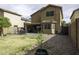 A nice backyard with covered patio is ready for entertaining and relaxing at 42006 W Hillman Dr, Maricopa, AZ 85138