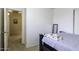 This cozy bedroom offers a comfortable space for rest and relaxation at 42006 W Hillman Dr, Maricopa, AZ 85138