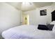Inviting bedroom with a comfortable bed, fresh white walls, and a bright, airy atmosphere at 42006 W Hillman Dr, Maricopa, AZ 85138