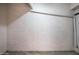 Unfinished basement with concrete floor and white painted concrete walls at 4336 E Piccadilly Rd, Phoenix, AZ 85018