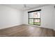 Bright and spacious bedroom with hardwood floors and backyard view at 4336 E Piccadilly Rd, Phoenix, AZ 85018