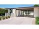 A covered carport and driveway with a modern design create an inviting entrance to this well-landscaped home at 4336 E Piccadilly Rd, Phoenix, AZ 85018