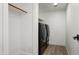Laundry room with shelving above brand new black front load washer and dryer on wood look flooring at 4336 E Piccadilly Rd, Phoenix, AZ 85018