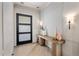Inviting entryway with stylish console table and decor at 4456 E Earll Dr, Phoenix, AZ 85018
