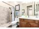 Bathroom featuring a walk-in shower with new fixtures and a white sink with wood cabinet at 4626 E Blue Spruce Ln, Gilbert, AZ 85298