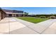 Community building with a large patio and grassy area for gatherings at 4626 E Blue Spruce Ln, Gilbert, AZ 85298