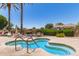 Relaxing spa with seating, landscaping, and beautiful architectural views at 4626 E Blue Spruce Ln, Gilbert, AZ 85298