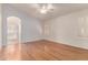 Bright bedroom with natural light, complemented by wood floors at 4826 W Ardmore Rd, Laveen, AZ 85339