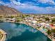 Beautiful waterfront property featuring a private pool and boat dock, perfect for enjoying lakeside living with mountain views at 5510 W Arrowhead Lakes Dr, Glendale, AZ 85308