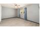 Empty bedroom with ceiling fan and tiled floors at 5510 W Arrowhead Lakes Dr, Glendale, AZ 85308