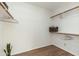 Walk in closet with lots of shelves and a basket for storage at 5510 W Arrowhead Lakes Dr, Glendale, AZ 85308