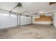 Spacious three car garage with ample parking and storage with three garage doors at 5510 W Arrowhead Lakes Dr, Glendale, AZ 85308