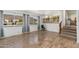 Spacious living room with lake views, tile floors, and staircase access at 5510 W Arrowhead Lakes Dr, Glendale, AZ 85308